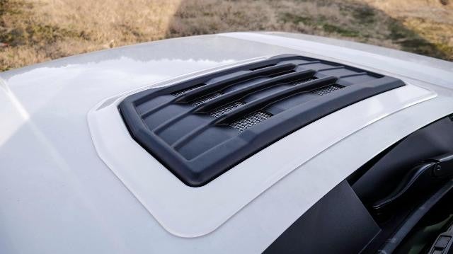 Close up view of the white GMC truck hood details