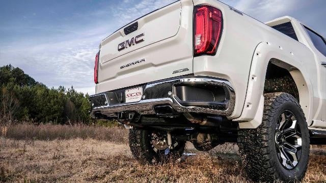 Close up view of a white GMC trunk